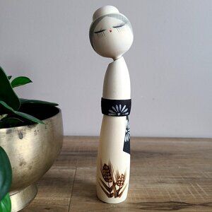 Traditional wooden Kokeshi doll.